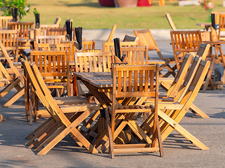 Image showing Teak furniture at outdoor restaurant