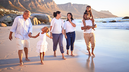 Image showing Generation big family walking beach in summer vacation, travel and freedom in South Africa. Happy, smile and carefree grandparents, parents and kids relax, bond and enjoy funny sunny holiday together