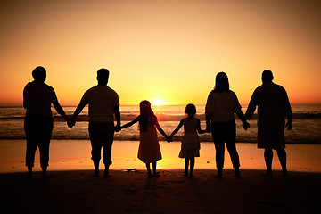 Image showing Big family silhouette on beach with sea waves, sunset on the horizon and holding hands for development wellness, support and love. Children and group of people watch ocean on dark, orange sky mockup