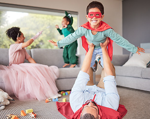 Image showing Happy parents and children in costume playing, bonding and having fun together in living room. Happiness, excited and family enjoying fantasy dress up for halloween entertainment with kids at home.