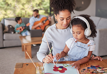 Image showing Art, love and happy family bonding in living room doing fun activity and relax together in their home. Learning, hobby and children enjoy time with parents in a music and creative picture painting