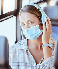 Image showing Bus travel, covid woman and headphones for music, podcast or radio in urban journey, transport and trip. Portrait of young girl listening to audio, face mask rules and corona virus safety on train