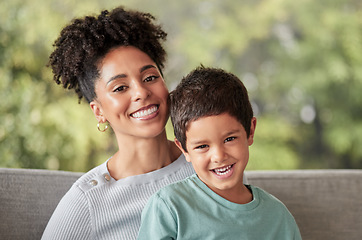 Image showing Portrait happy kid, mom and mothers day, love and care relaxing together on living room sofa in family home. Young boy child, smile parent and happiness while bonding, enjoying quality time and fun