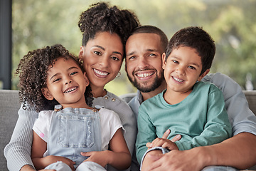 Image showing Smile, portrait and happy family love to relax together in a positive home on a fun weekend for bonding. Happiness, mother and father smiling with young Latino kids or children enjoying quality time