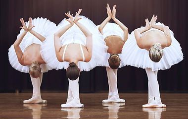 Image showing Ballet ballerina women teamwork on dancing stage together for collaboration, elegant and theatre creativity performance. Professional group of dance studio academy people on creative art concert show