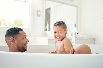 Image showing Happy, bathroom and shower with father and child in the morning for cleaning, family and love. Relax, wellness and smile with dad and baby in bathtub together for care, lifestyle and health at home