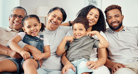 Image showing Family on sofa smile with parents, children and their grandparents in home living room. Group of people with kids, mom and dad sit on couch, with happy grandma and grandpa together