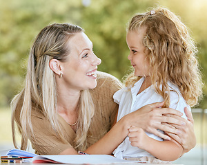 Image showing Education, mother and child student writing school homework, learning knowledge and lesson in a notebook. Happy, smile and proud math tutor helping and teaching her creative child in the family house