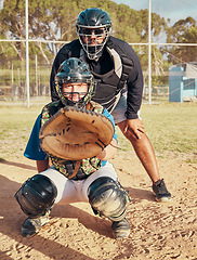 Image showing Baseball, sport and training with a sports man or catcher on a field for fitness and exercise outdoor during summer. Workout, health and focus with a male player ready to catch during a game or match