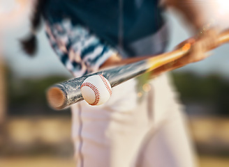 Image showing Baseball player, bat and ball while swinging during sports game, match or training outside. Closeup of a fit female, professional athlete and hands of a competitive woman playing in a competition