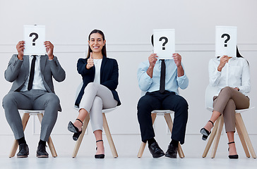 Image showing Recruitment, question mark and thumbs up business woman with smile in hiring, interview or feedback review in workplace. Question, ok and yes from employee for thank you, welcome and success teamwork