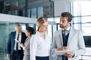 Image showing Teamwork, solution or business people with tablet planning or meeting for an online project strategy. Digital research, data analysis or workers working on problem solving, technology or talking