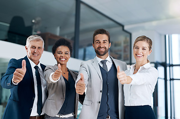 Image showing Portrait, thumbs up or group of business people in agreement, support or collaboration together in office. Community, teamwork or happy employees smile with diversity, yes sign or like hand gesture