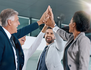 Image showing Group, success or happy business people high five in celebration of goals, target or teamwork. Partnership mission, smile or excited workers in office for motivation, solidarity or winning a deal