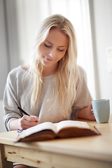 Image showing Coffee, relax and woman writing in a book at home for idea, planning or creative, research or diary. Notebook, education and female student in a house with tea while brainstorming homework assignment