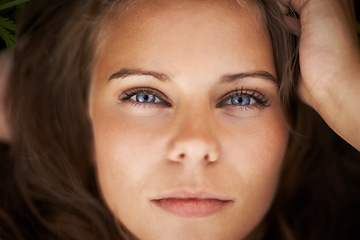 Image showing Portrait, eyes and natural beauty of woman outdoor, healthy skin and wellness. Face, closeup and attractive young person, aesthetic and cosmetics for facial treatment in nature in Switzerland.