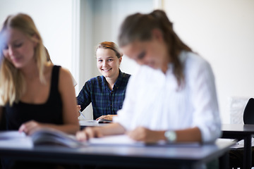 Image showing College student, portrait and learning with notes in class, lecture or people in education. University, classroom and face of happy woman with notebook, knowledge and studying in academy or school