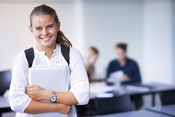 Image showing Girl, portrait and teenager with laptop in classroom, back to school and excited for learning. Academy, student and happy face with computer or tech for education, study and kid with a scholarship