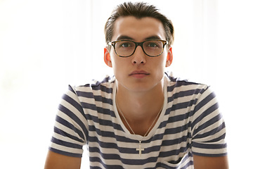 Image showing Serious, man and portrait with glasses in studio, white background and eyewear spectacles mockup. Person, face and Christian male with necklace and frames with lenses for vision, sight and fashion