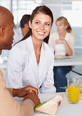 Image showing Business people, friends and discussion at lunch table in corporate office together. Coworking, man and woman on break, eating food and happy team in communication, meeting and listen to conversation