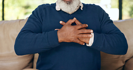 Image showing Hands, senior man and heart attack with pain, cardiovascular healthcare and risk of hypertension at home. Closeup, elderly injury and heartburn in chest, indigestion and medical emergency for stroke