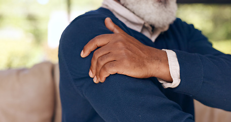 Image showing Senior man, hands and shoulder with pain in home from arthritis, osteoporosis and tired joints, muscle and medical emergency. Closeup, elderly and help for arm injury, fibromyalgia or healthcare risk