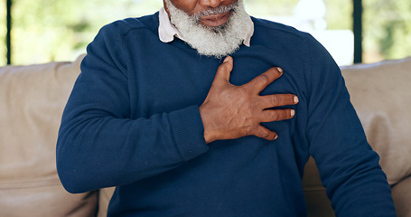 Image showing Hands, elderly man and heart attack in home with pain, cardiovascular healthcare and risk of hypertension. Closeup, senior and chest with heartburn, indigestion or medical emergency of stroke on sofa