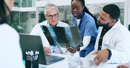 Image showing Medical, team and xray of anatomy in hospital with analysis, discussion and health assessment for legs. Healthcare, doctor or nurse with collaboration, meeting or study of patient results for surgery