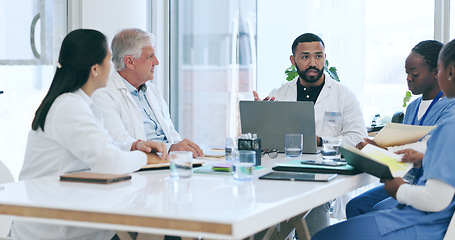 Image showing Doctors, nurses and medical group in meeting, teamwork and planning or discussion of hospital or clinic workflow. Mentor or healthcare people on laptop, notebook ideas and solution or research advice