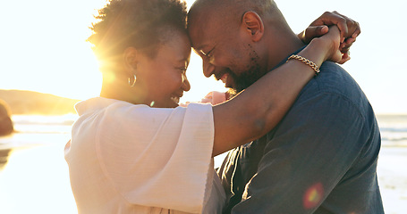 Image showing Couple, hug or smile on beach with love, bonding and sunlight for holiday, vacation or relationship. Black people, man or woman with embrace, happy and romance by ocean or sea for travel or adventure