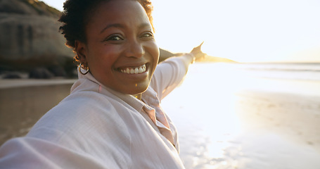 Image showing Woman, selfie and beach or portrait at sunrise, relaxing and peace for social media, post and update on holiday. Happy black person, pointing and ocean on vacation, getaway and travel, fun or nature