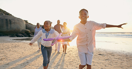 Image showing Children, sand or beach with toy airplane for love, happy or summer vacation to play wellness. Black family, smile or siblings to fly plane game at sea, travel or cape town freedom by horizon