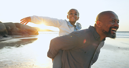 Image showing Father, beach and piggyback with girl, happy and smile for joy, sunset and playful. Parent, child and fun with dad, freedom or joy for childhood, carefree or weekend for laugh, enjoy and love