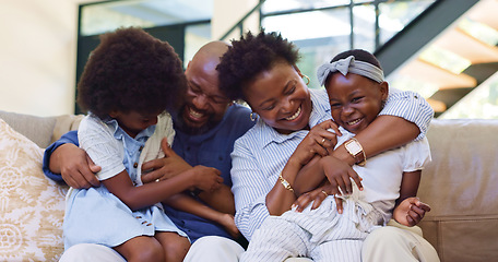 Image showing Happy, black family and hug with love on sofa with children and parents together laughing in home. African, mother and father playing with kids on couch in Nigeria living room with support and care