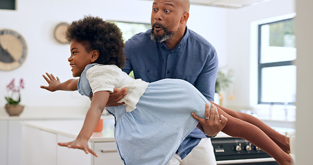 Image showing Child, dad and happy with airplane game in kitchen, freedom and fun with love bonding in home. Black family, playing and fantasy flying with arms in air, young daughter and trust together in house