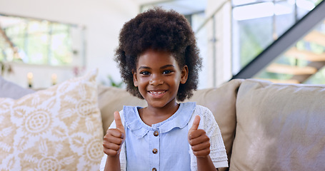 Image showing Home, portrait and black girl with thumbs up, smile and relax with support, agreement and feedback. African person, apartment or kid in a lounge, hand gesture and child with happiness, like or review