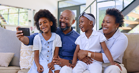 Image showing Selfie, happy family and children with smile in living room profile picture, social media or post. Black man, woman and girl with excitement for childhood memory, bonding and together on sofa in home