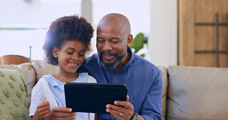 Image showing Father, daughter and tablet with smile on sofa for games, streaming or elearning in living room of home. Black family, man and girl child with touchscreen, happiness or technology for watching movie