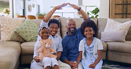 Image showing Black family, roof hands or portrait of happy kids in living room at home for support or insurance. Security, property investment or parents with children siblings for cover, safety or protection