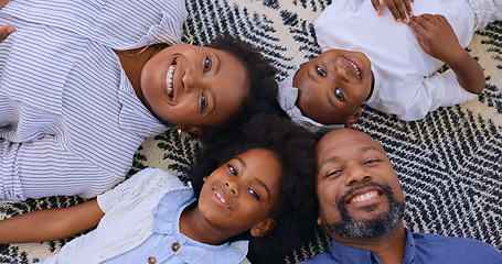 Image showing Top view, father or portrait of mother with happy kids in home to relax on holiday vacation with smile. Black family, mom or African dad bonding with girl siblings, love or children on carpet floor