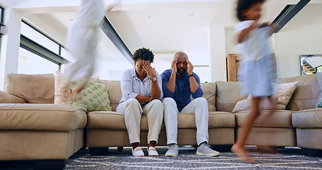 Image showing Parents, stress and headache from children in home with noise, energy or overwhelmed in living room. Hyper active, adhd and tired mother and father with burnout from kids running, games or chaos