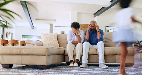 Image showing Running kid, tired parents and headache on a sofa with stress, anxiety or fatigue at home. Family, noise and frustrated people in a living room with hyper child, burnout or overwhelmed by adhd energy