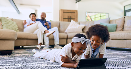 Image showing Family, children and tablet on floor watching cartoons, parents and living room couch. Screen time, relaxing and streaming while bonding together as siblings, technology and childhood memories