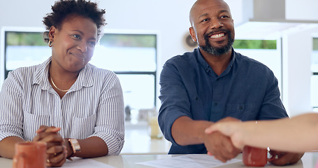 Image showing Meeting, handshake and couple with financial advisor for home purchase deal together. Happy, smile and African man and woman shaking hands with real estate agent for house, apartment or property.