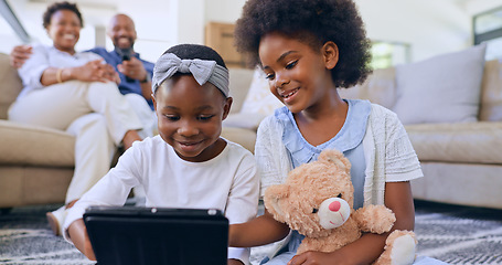 Image showing Happy family, kids and tablet on floor watching cartoons, parents and living room couch. Internet, relaxing and streaming while bonding together as siblings, technology and childhood memories