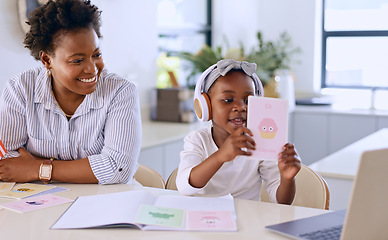 Image showing Learning, laptop and mom with child in home on letters with kindergarten, project and elearning homework. Color, card and mother with girl listening to video on computer for education or development