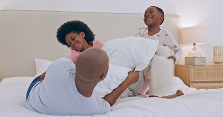 Image showing Bedroom, pillow fight and black family father, happy kids or people bonding, fun and papa playing with young youth. Home, games and African children, dad and girl energy, morning and excited on bed