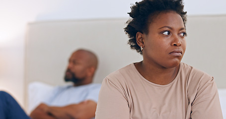 Image showing Angry, divorce and black couple in home with conflict, fight or thinking about affair and marriage. African, woman or frustrated in bedroom with stress, problem or depressed from fail in relationship