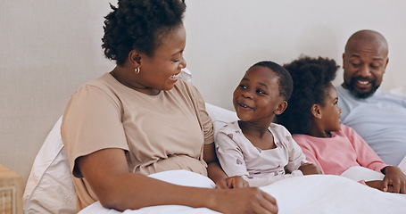 Image showing Bedroom, relax and black family mom, happy kids or dad bonding, love and care for young girl. Home conversation, discussion and African children, father and mother support, comfort and talking on bed