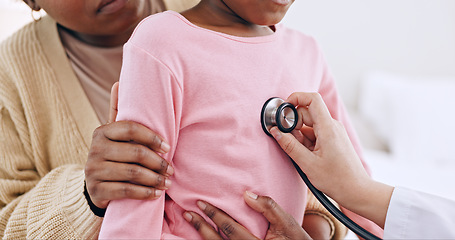 Image showing Doctor, child and chest with stethoscope in closeup for examination, medical appointment or checkup in home. Paediatrician, cardiology and listen to breathing, lungs or heart in problem for illness